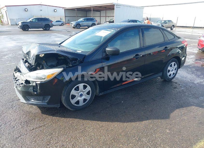 Photo 2 of 2017 Ford Focus S (VIN 1FADP3E25HL230478)