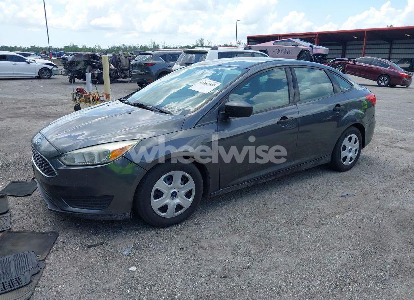 Photo 2 of 2016 Ford Focus S (VIN 1FADP3E26GL376838)