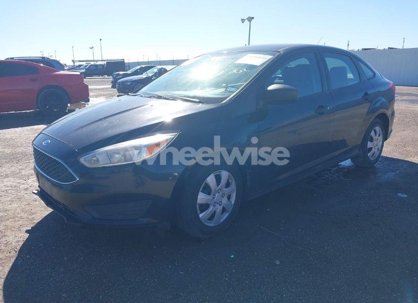 Photo 2 of 2017 Ford Focus S (VIN 1FADP3E26HL255924)