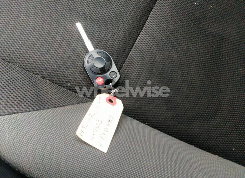 Photo 11 of 2014 Ford Focus S (VIN 1FADP3E28EL439323)