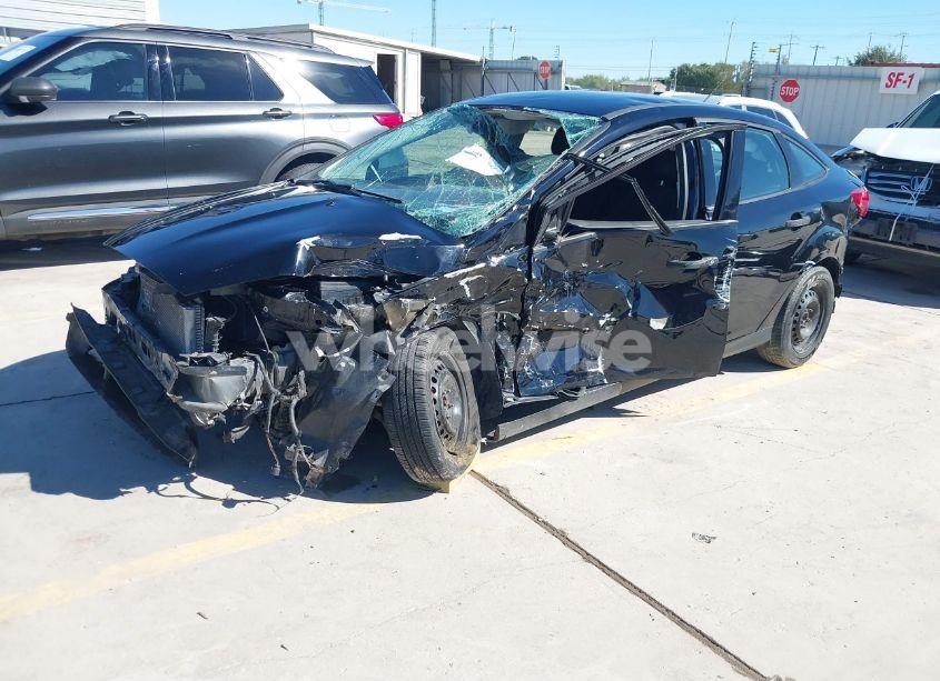 Photo 2 of 2017 Ford Focus S (VIN 1FADP3E28HL318702)