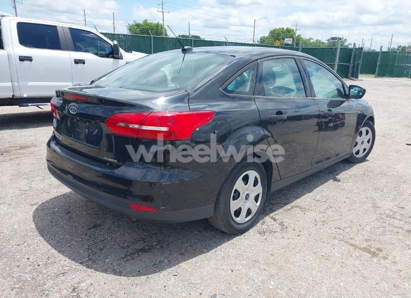 Photo 4 of 2015 Ford Focus S (VIN 1FADP3E29FL210652)