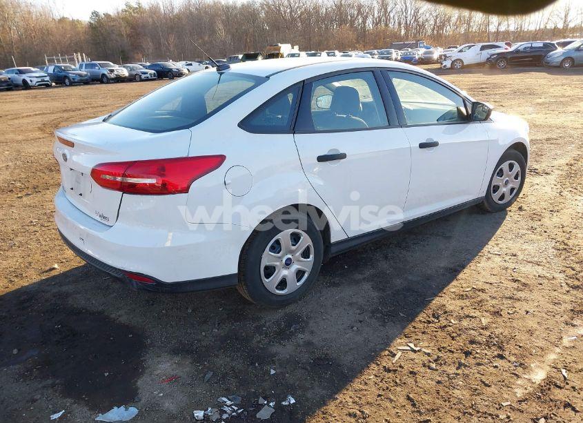 Photo 4 of 2017 Ford Focus S (VIN 1FADP3E2XHL321942)