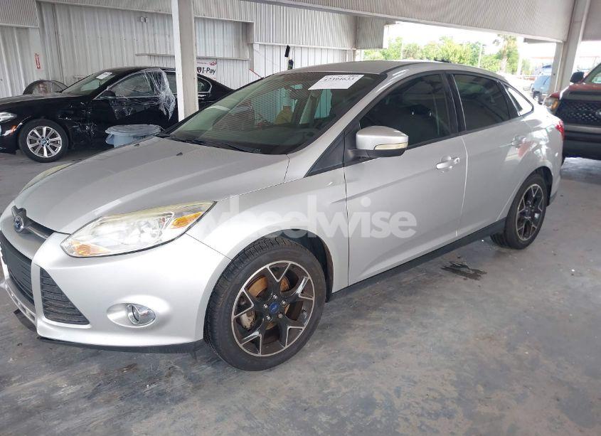 Photo 2 of 2013 Ford Focus SE (VIN 1FADP3F20DL161594)