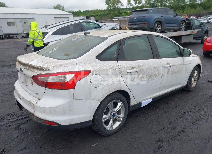 Photo 4 of 2013 Ford Focus SE (VIN 1FADP3F20DL302583)