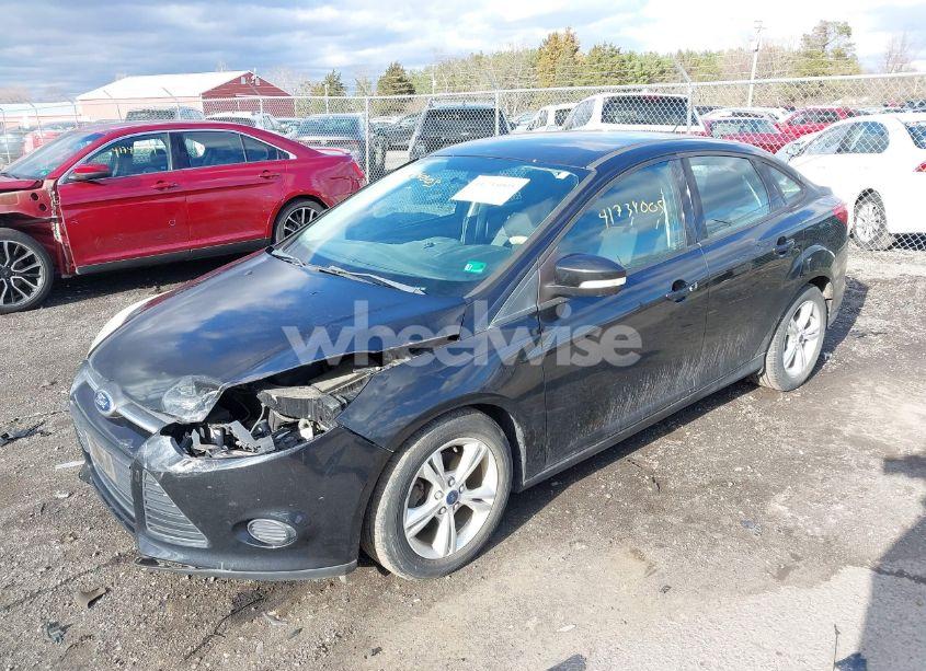 Photo 2 of 2013 Ford Focus SE (VIN 1FADP3F20DL314751)