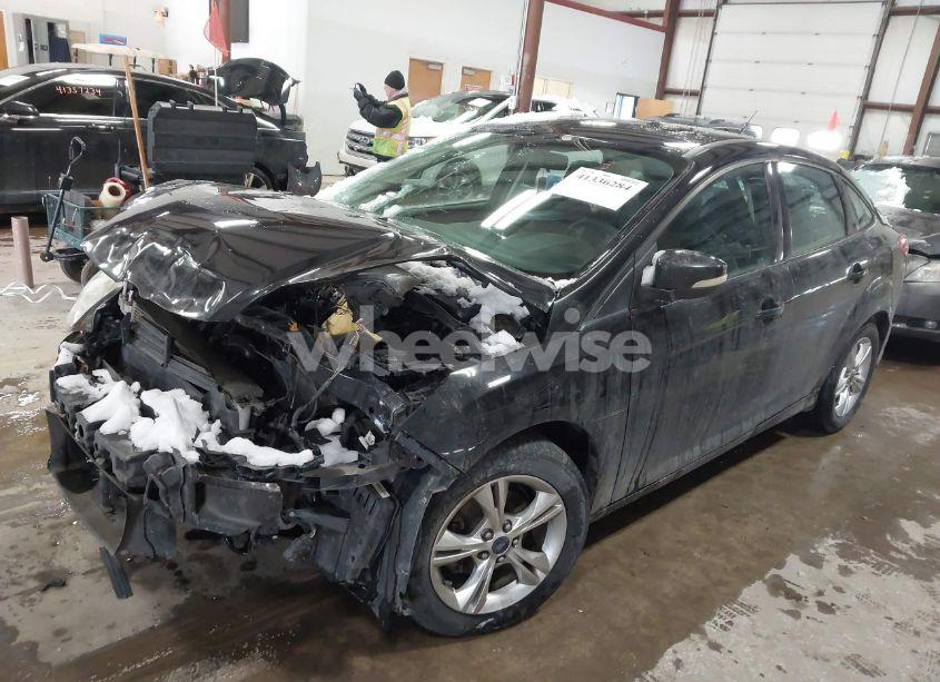 Photo 2 of 2013 Ford Focus SE (VIN 1FADP3F20DL324342)