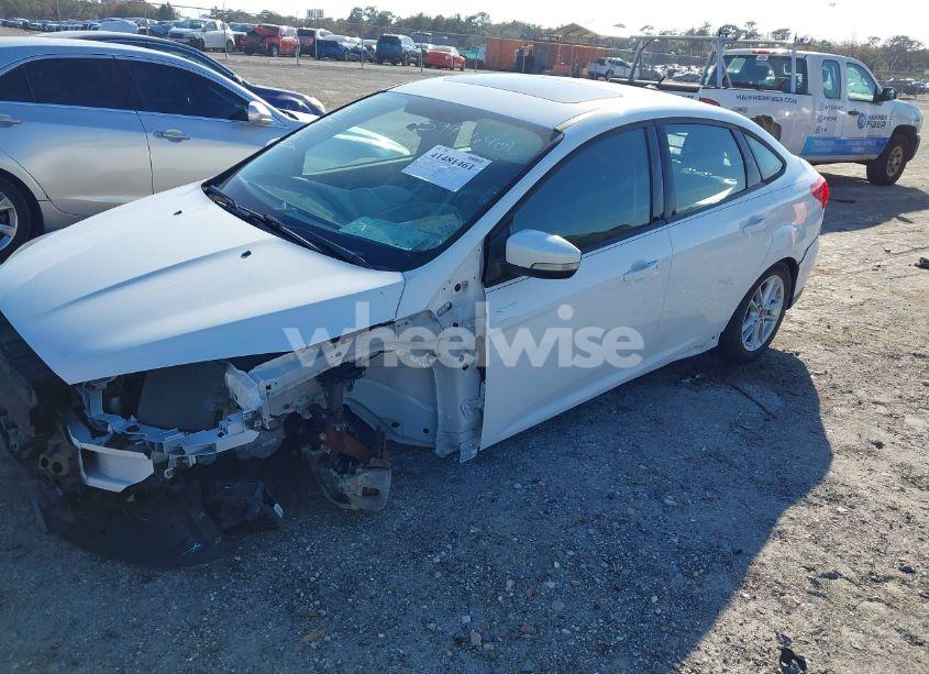 Photo 2 of 2016 Ford Focus SE (VIN 1FADP3F20GL266320)