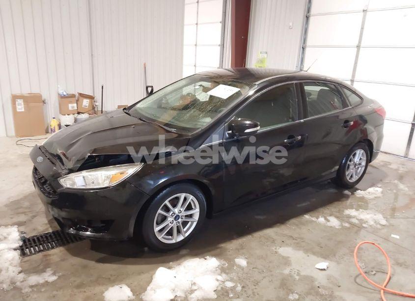 Photo 2 of 2016 Ford Focus SE (VIN 1FADP3F20GL386568)