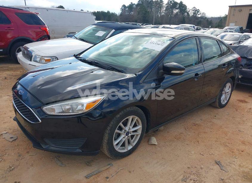 Photo 2 of 2017 Ford Focus SE (VIN 1FADP3F20HL262267)