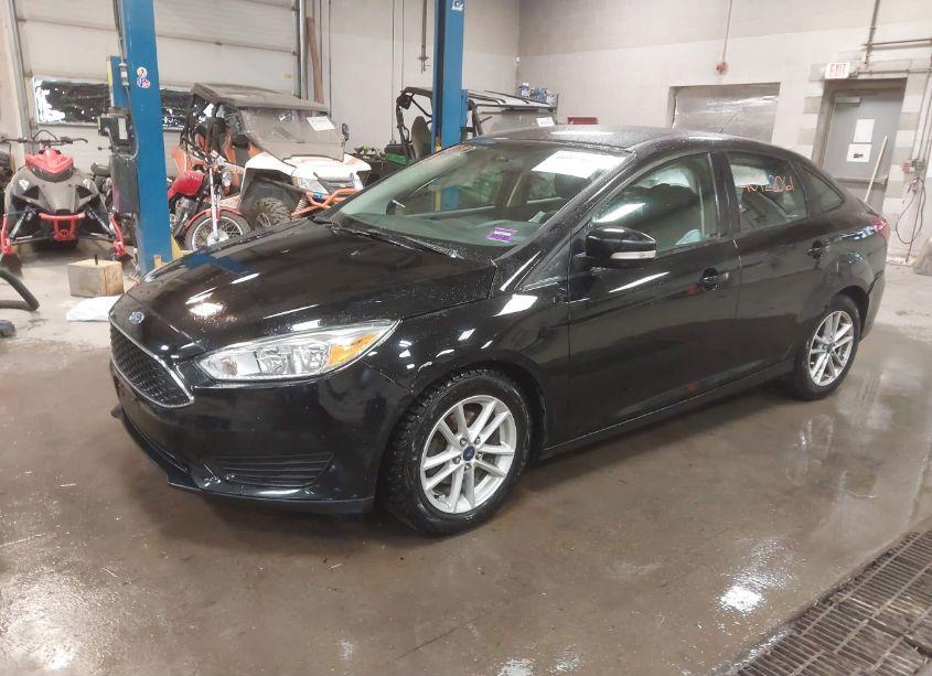 Photo 2 of 2017 Ford Focus SE (VIN 1FADP3F20HL265928)
