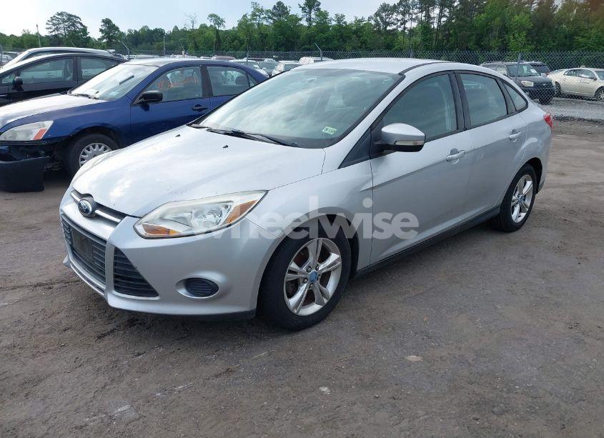 Photo 2 of 2013 Ford Focus SE (VIN 1FADP3F21DL142200)