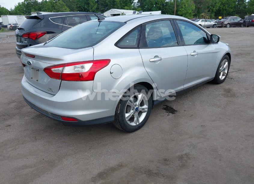 Photo 4 of 2013 Ford Focus SE (VIN 1FADP3F21DL142200)