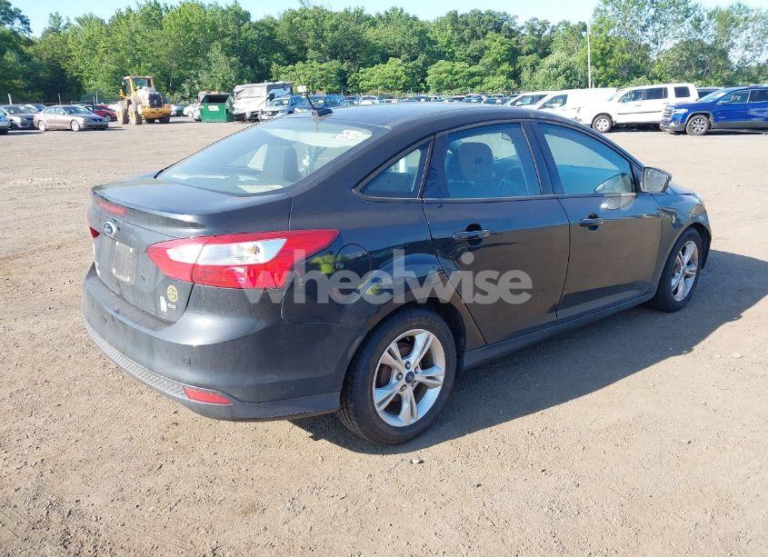 Photo 4 of 2013 Ford Focus SE (VIN 1FADP3F21DL230177)