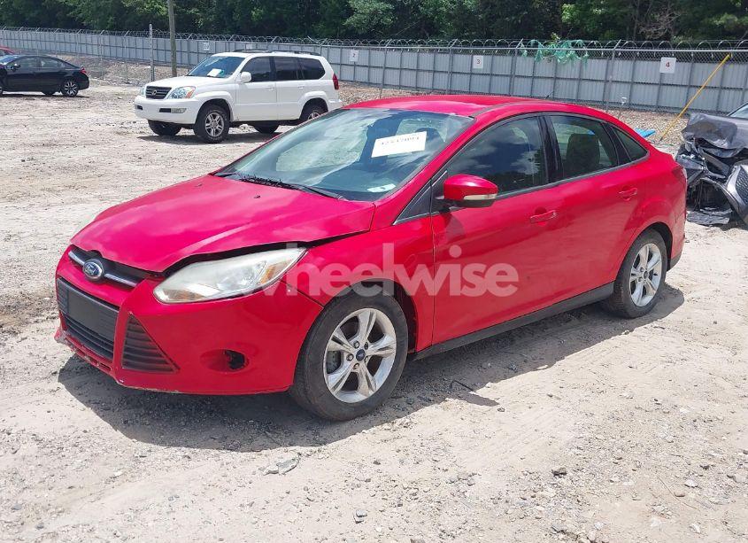 Photo 2 of 2013 Ford Focus SE (VIN 1FADP3F21DL266919)