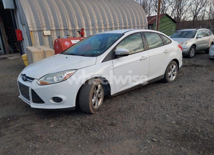 Photo 2 of 2013 Ford Focus SE (VIN 1FADP3F21DL288189)