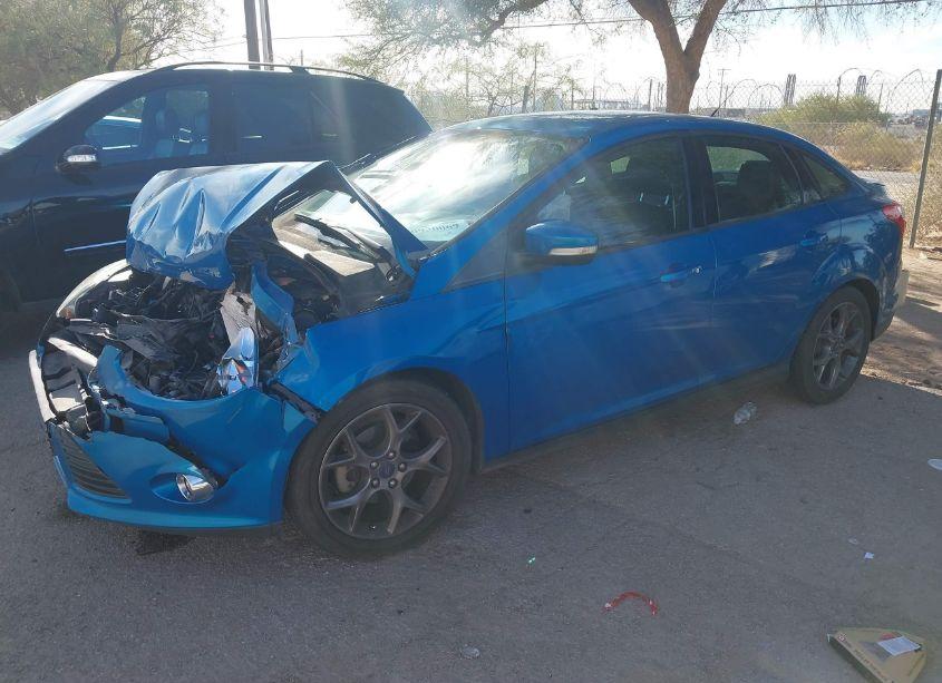 Photo 2 of 2013 Ford Focus SE (VIN 1FADP3F21DL303497)