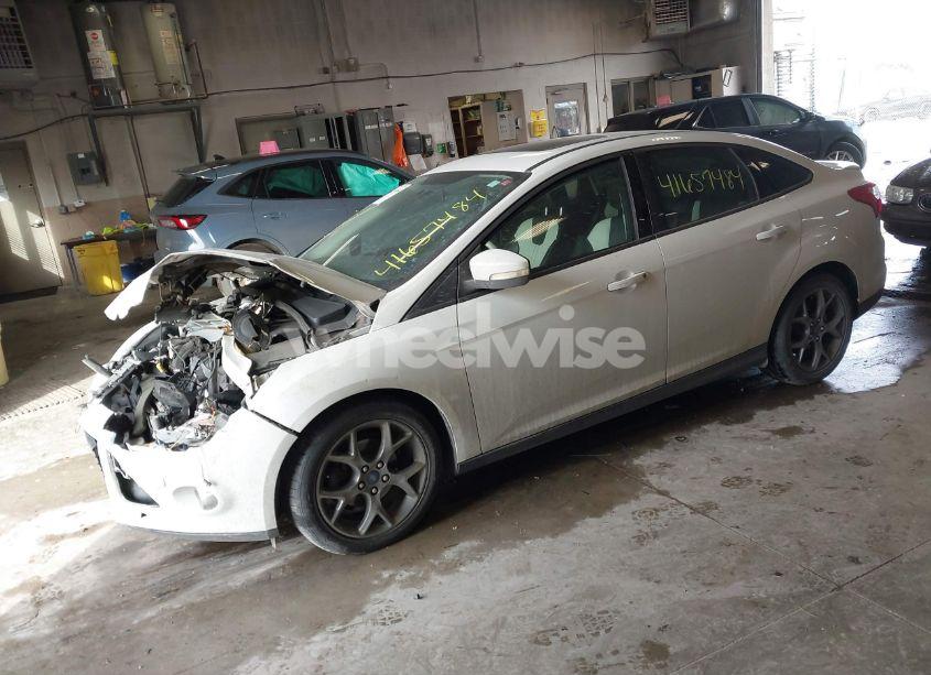 Photo 2 of 2013 Ford Focus SE (VIN 1FADP3F21DL306920)