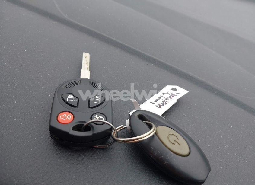 Photo 11 of 2014 Ford Focus SE (VIN 1FADP3F21EL363197)