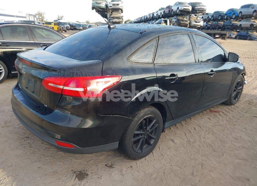 Photo 4 of 2016 Ford Focus SE (VIN 1FADP3F21GL201475)