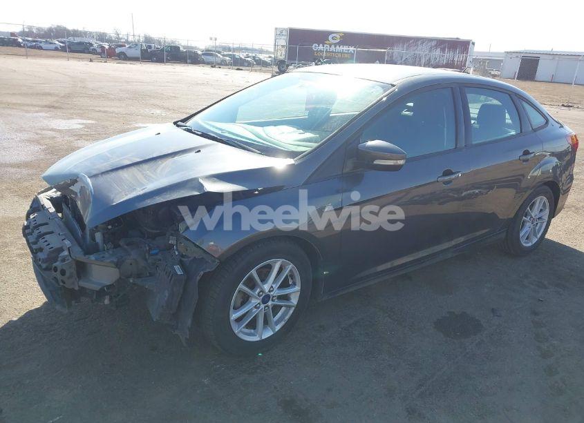 Photo 2 of 2016 Ford Focus SE (VIN 1FADP3F21GL212718)