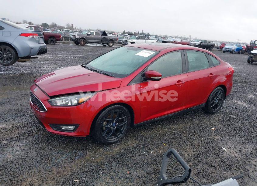 Photo 2 of 2016 Ford Focus SE (VIN 1FADP3F21GL234718)