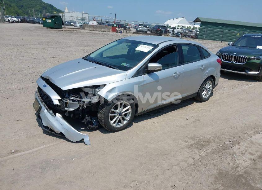 Photo 2 of 2016 Ford Focus SE (VIN 1FADP3F21GL248764)