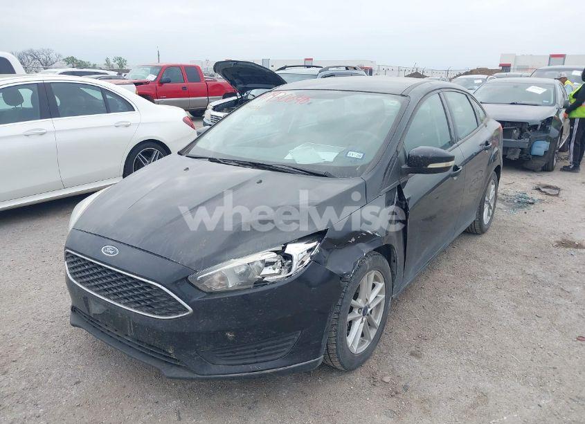 Photo 2 of 2016 Ford Focus SE (VIN 1FADP3F21GL305027)