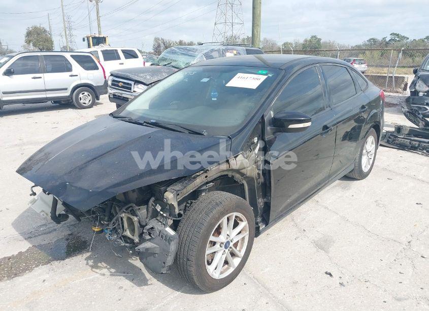 Photo 2 of 2016 Ford Focus SE (VIN 1FADP3F21GL357208)