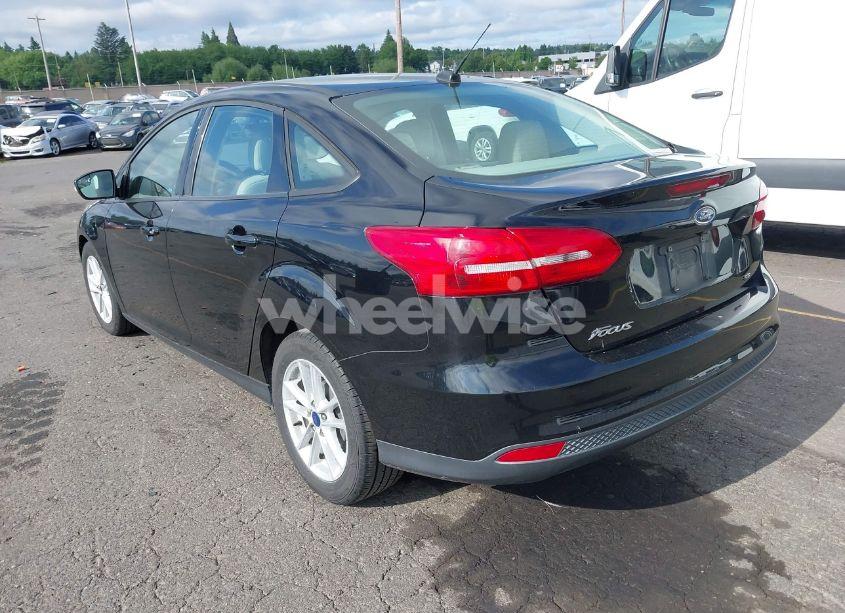 Photo 3 of 2017 Ford Focus SE (VIN 1FADP3F21HL218021)