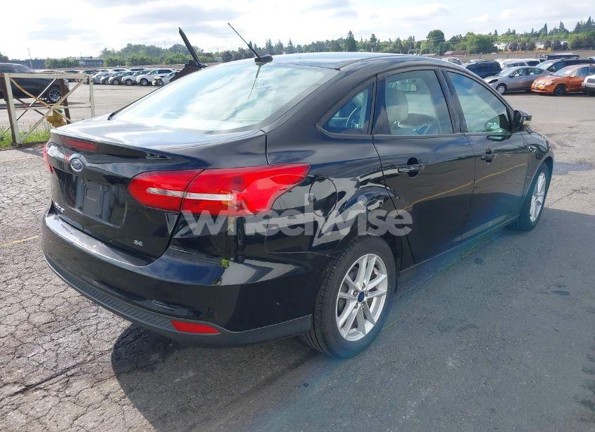 Photo 4 of 2017 Ford Focus SE (VIN 1FADP3F21HL218021)