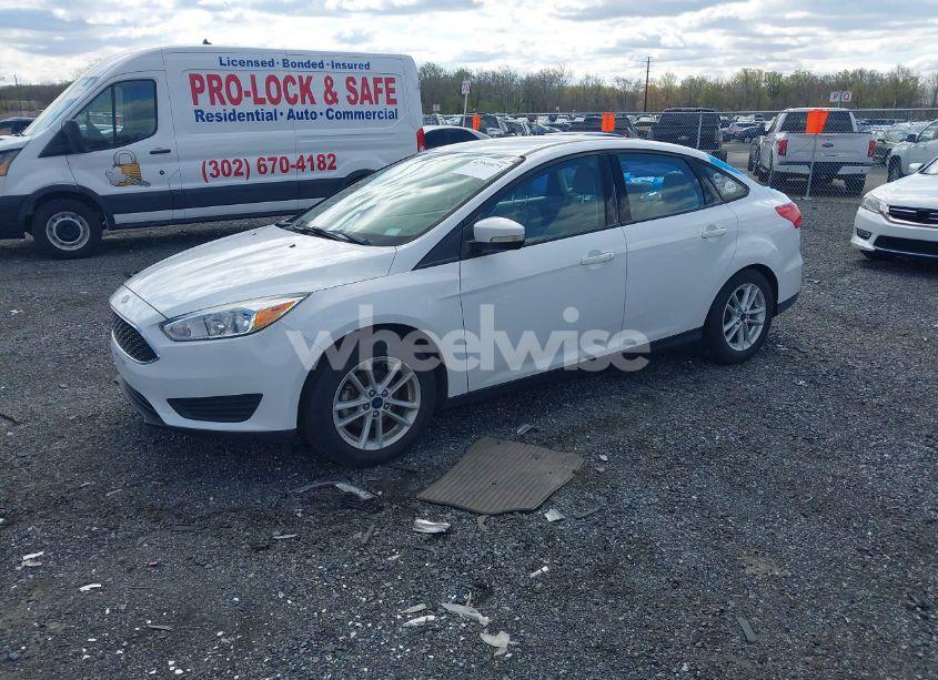 Photo 2 of 2017 Ford Focus SE (VIN 1FADP3F21HL234669)