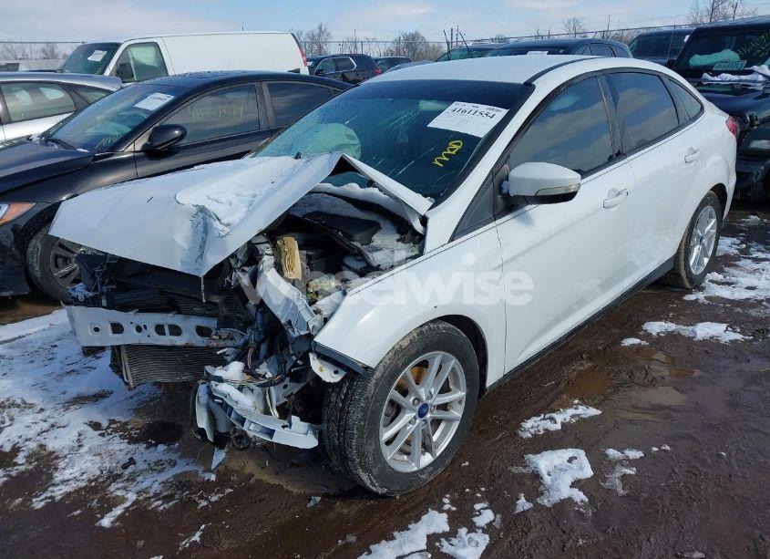 Photo 2 of 2017 Ford Focus SE (VIN 1FADP3F21HL329118)