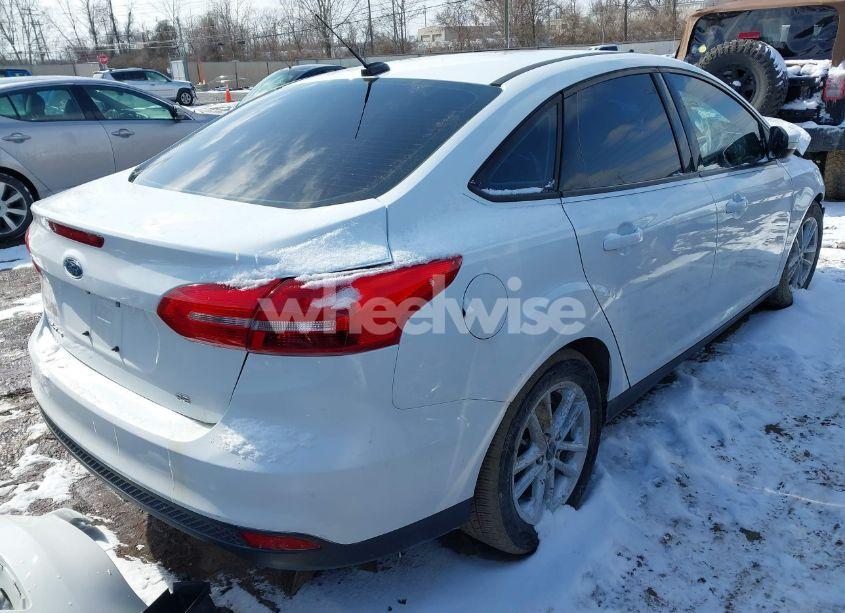 Photo 4 of 2017 Ford Focus SE (VIN 1FADP3F21HL329118)
