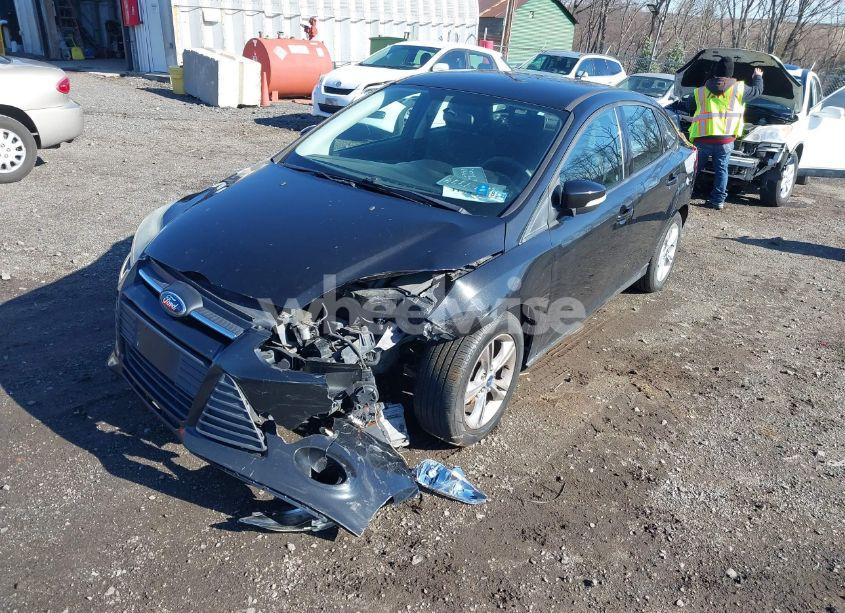 Photo 2 of 2013 Ford Focus SE (VIN 1FADP3F22DL121744)