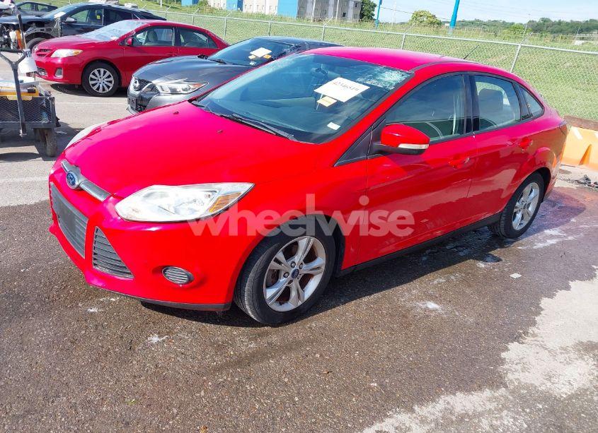 Photo 2 of 2013 Ford Focus SE (VIN 1FADP3F22DL175397)