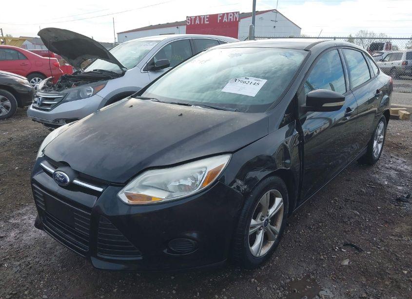 Photo 2 of 2013 Ford Focus SE (VIN 1FADP3F22DL242502)