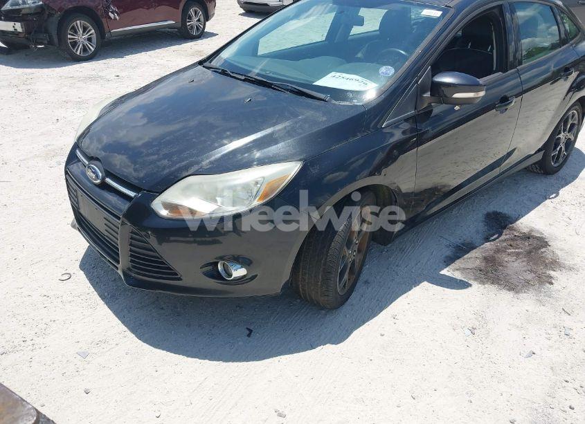 Photo 2 of 2013 Ford Focus SE (VIN 1FADP3F22DL353728)