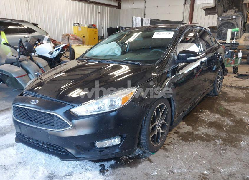 Photo 2 of 2015 Ford Focus SE (VIN 1FADP3F22FL211401)