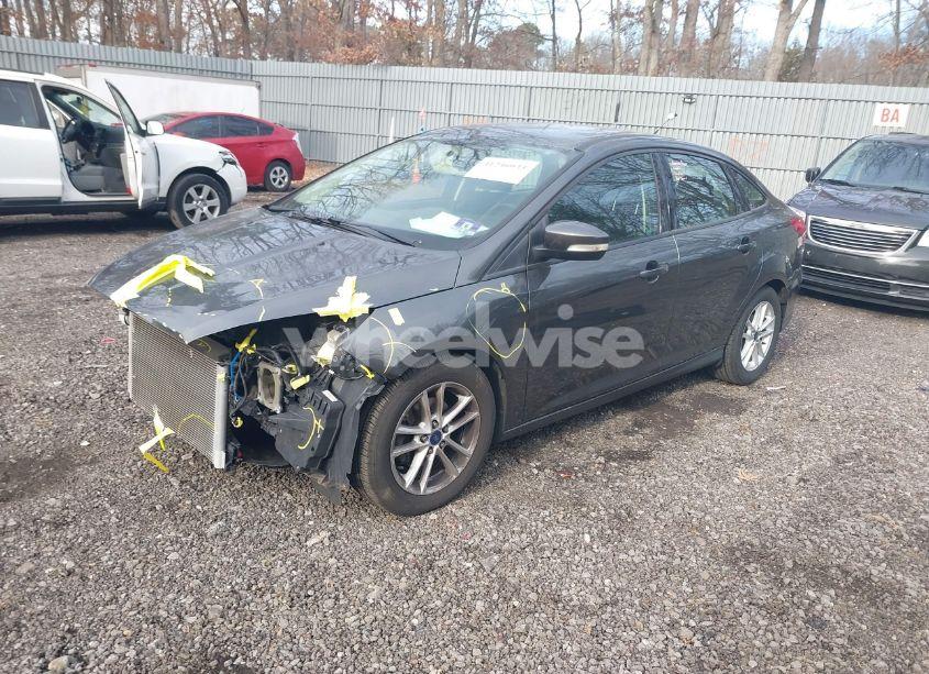 Photo 2 of 2017 Ford Focus SE (VIN 1FADP3F22HL201034)