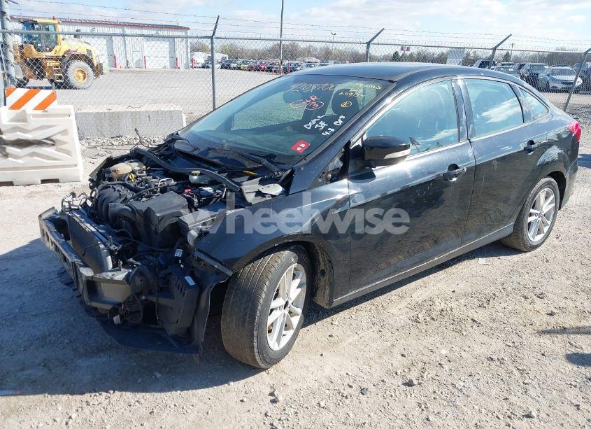 Photo 2 of 2017 Ford Focus SE (VIN 1FADP3F22HL209134)
