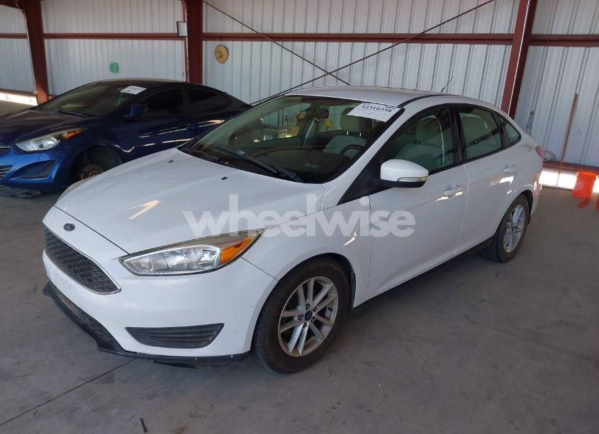 Photo 2 of 2017 Ford Focus SE (VIN 1FADP3F22HL303059)