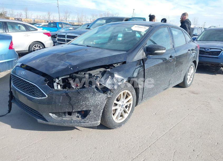 Photo 2 of 2017 Ford Focus SE (VIN 1FADP3F22HL323652)