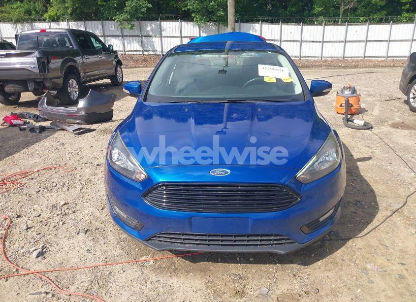 Photo 12 of 2018 Ford Focus SE (VIN 1FADP3F22JL298824)