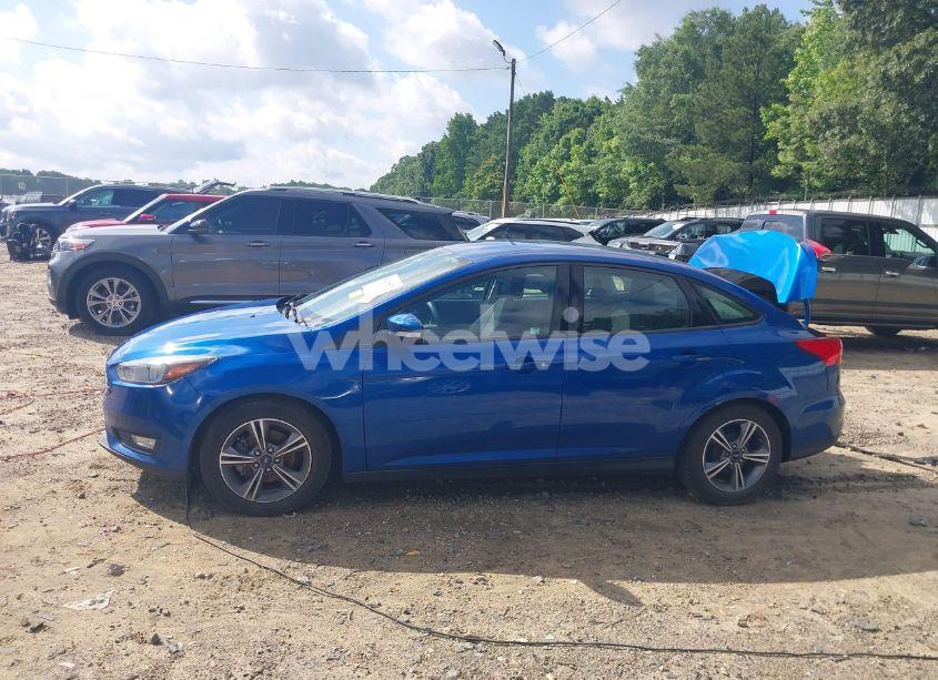 Photo 14 of 2018 Ford Focus SE (VIN 1FADP3F22JL298824)