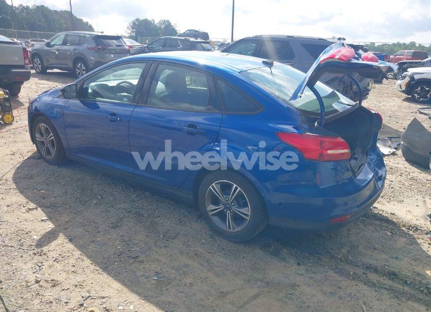 Photo 3 of 2018 Ford Focus SE (VIN 1FADP3F22JL298824)