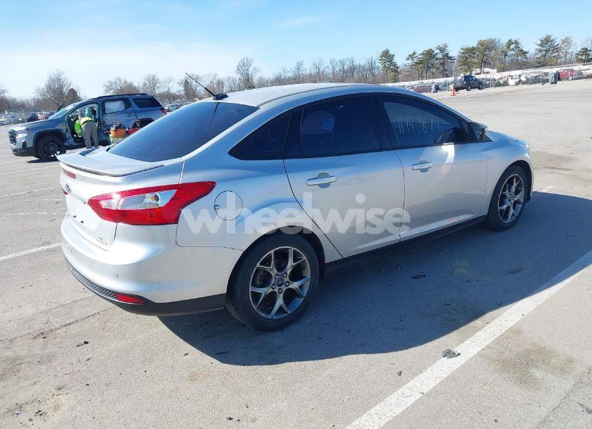 Photo 4 of 2013 Ford Focus SE (VIN 1FADP3F23DL143638)