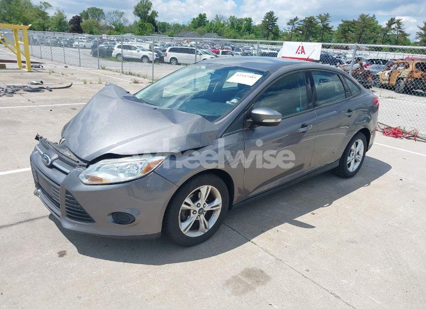 Photo 2 of 2013 Ford Focus SE (VIN 1FADP3F23DL289683)