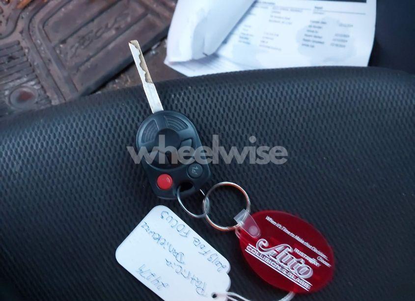 Photo 11 of 2013 Ford Focus SE (VIN 1FADP3F23DL312489)