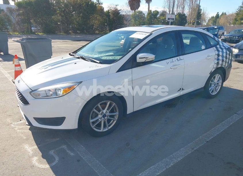 Photo 2 of 2015 Ford Focus SE (VIN 1FADP3F23FL289301)